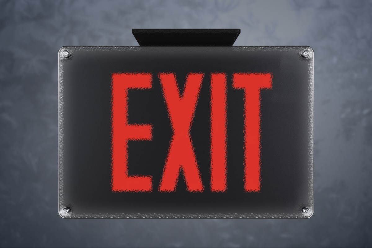 Ingress Protection Ratings: What you need to know An Isolite exit sign covered by a protective plastic cover