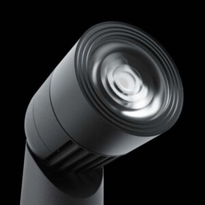 Close-up image of an OLLO lamp head showcasing the lamp's optics.